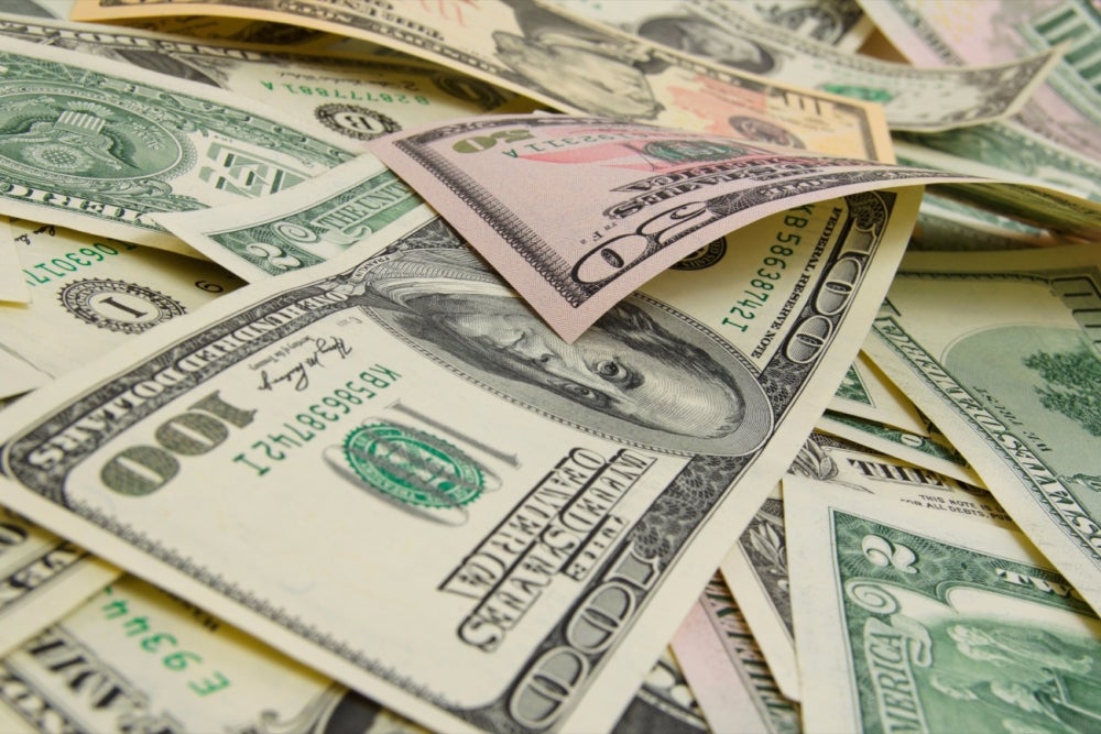 Pile of hundred dollar bills